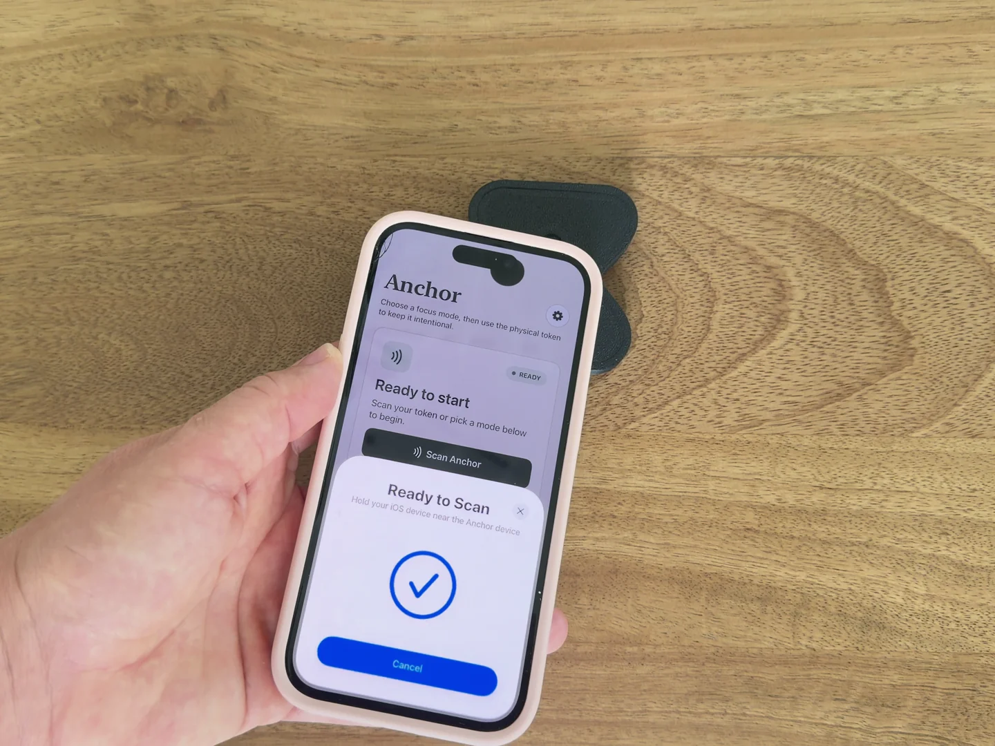 The real Anchor app confirming a successful scan above the physical Anchor before Facebook is blocked